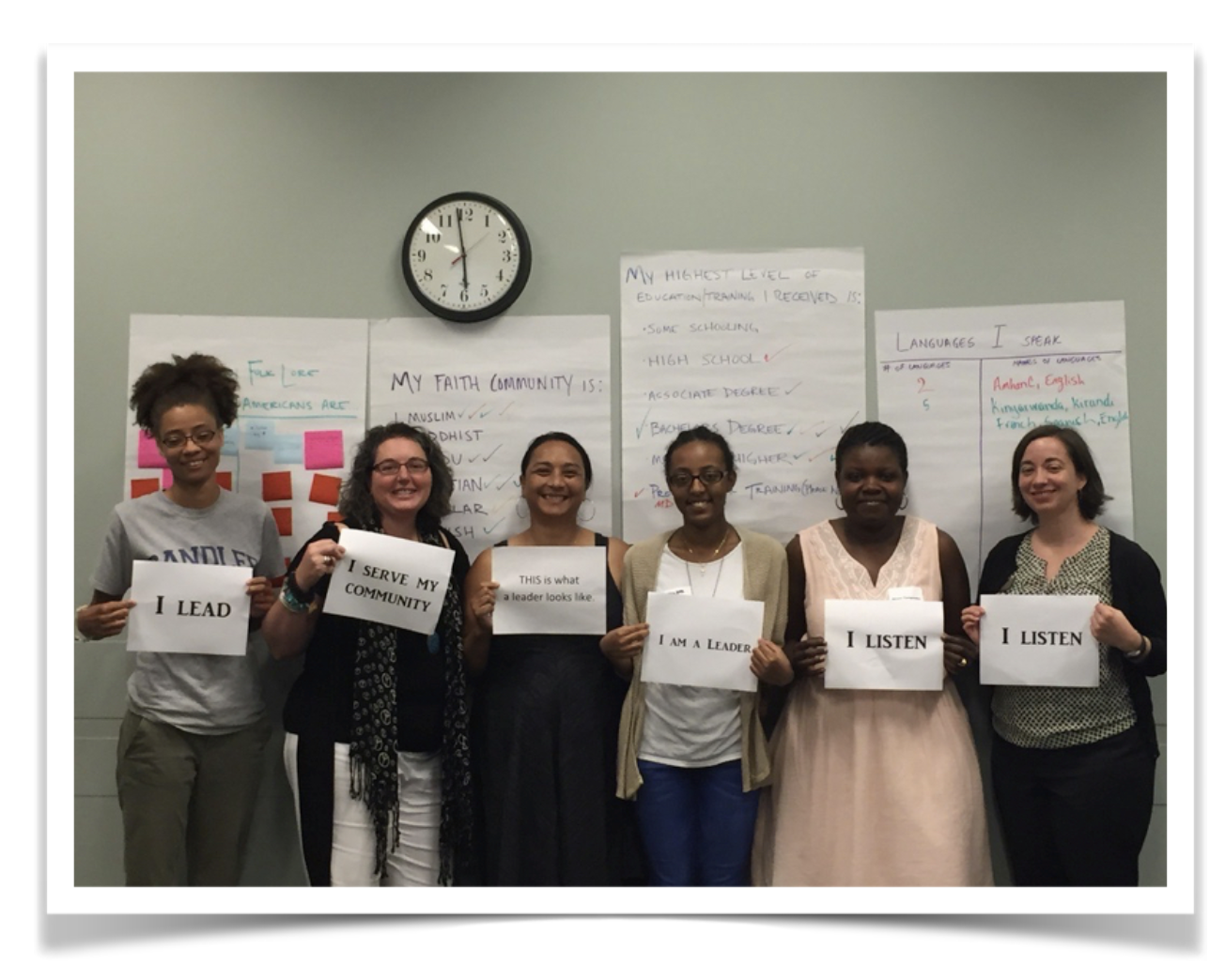 Compassionate Atlanta team holding signs