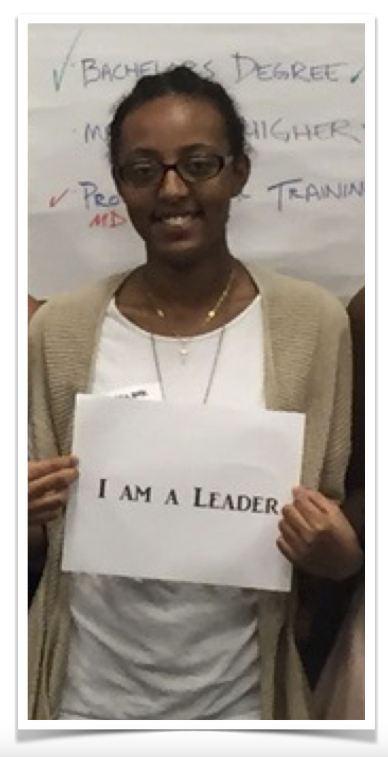 Gunawork holding an I Am A Leader sign