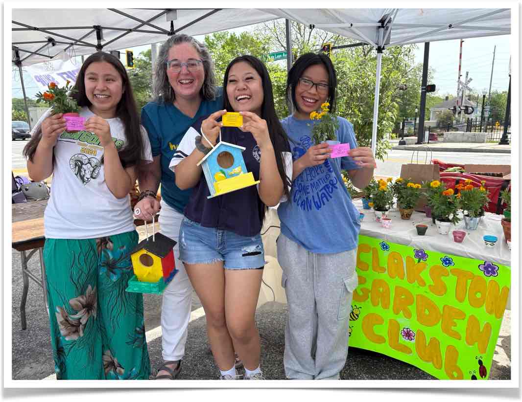 People holding love notes at a market