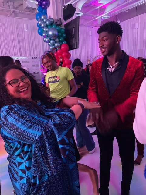 Co-Director Iyabo Onipede and Lil Nas X at a Compassionate Atlanta event, celebrating their partnership to combat HIV stigma and promote health equity.